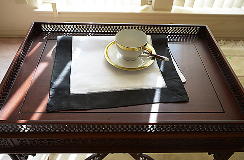 White Hemstitch Placemat with Black Color Borders.